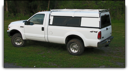 Ranger aluminum truck cap with side access doors.